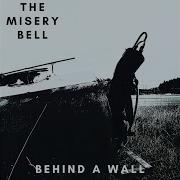 The Misery Bell Behind A Wall